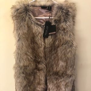 Faux fur vest, new with tag!